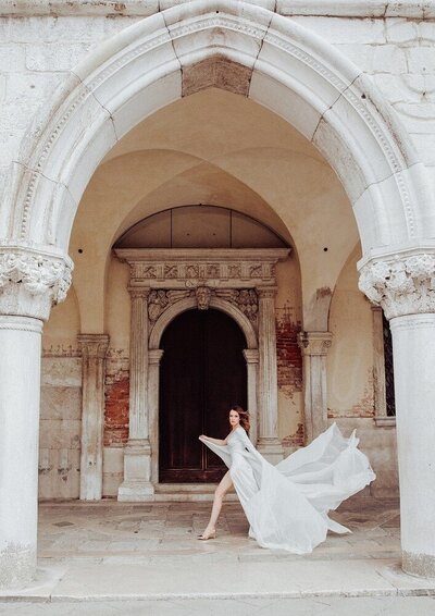 Bride in a white dress in Venice, Italy.