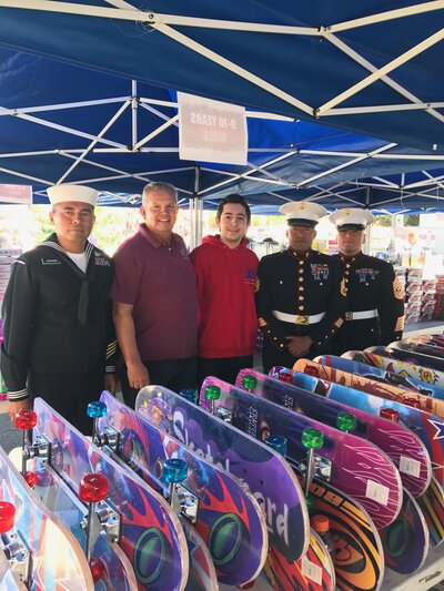 Joe Kaprielan with partners and the donations