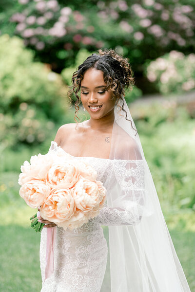 Bride applying lipstick