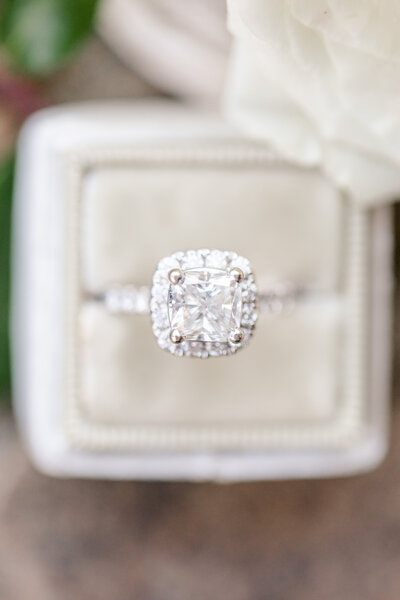 diamond engagement ring in white ring box