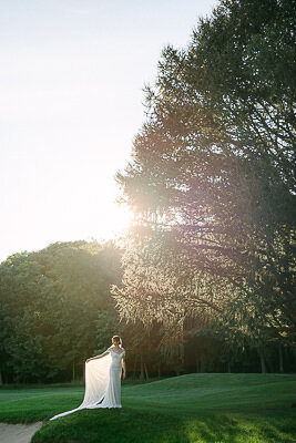 Portrait of the bride in the light of the setting sun.