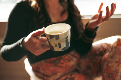 brand photographer drinking coffee in southern Alberta. 
