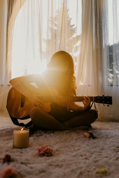 Luna Skye playing guitar