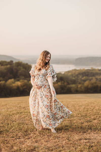 family maternity photos with a dad toddler and pregnant mother in harrisburg with neutral warm tones