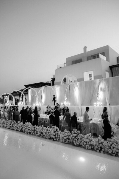 Wedding reception decor with white draping at a Mykonian villa.