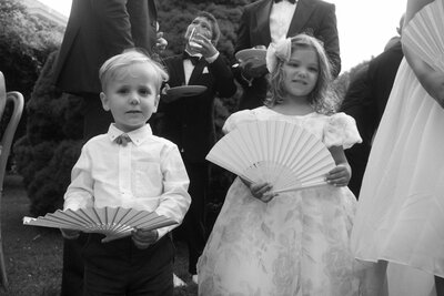 Wedding guests cocktail hour by the pool at private residence wedding in the hamptons new york, East coast documentary-style wedding photographer for the untraditional