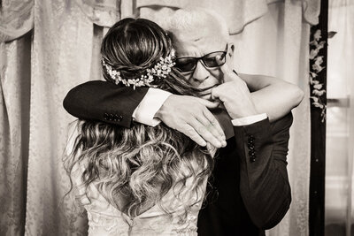 Bride shares emotional embrace with father before ceremony – tearful wedding moment captured in NJ