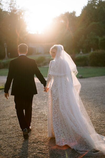 a wedding couple embracing at their wedding in ireland at adare manor