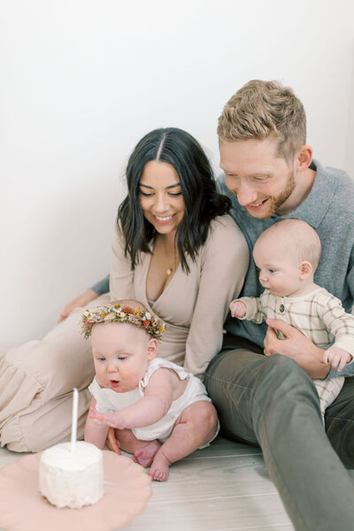 parents and two babies one year and 6 months old by one of the leading spokane photographers