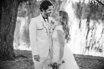 couple walking hand in hand at clementine hall wedding nashville wedding venue