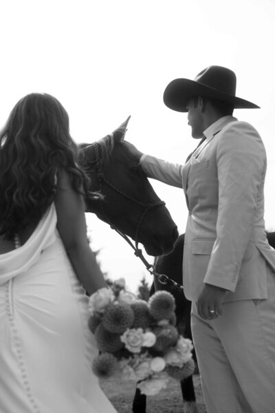 Bride and groom with their horse on their wedding day near Maple Valley, WA