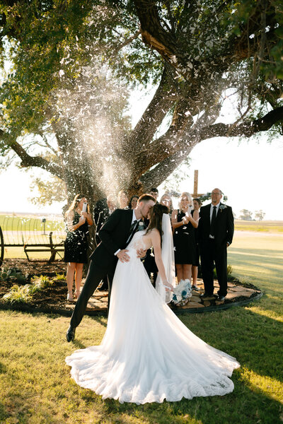bride and groom dancing together at their wedding reception in Oklahoma