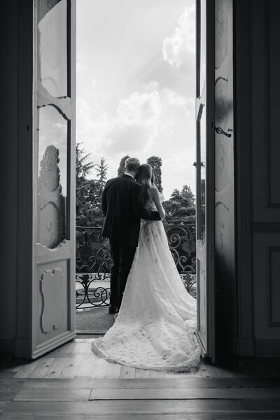 Bride and groom walk up memorial steps at their DC wedding