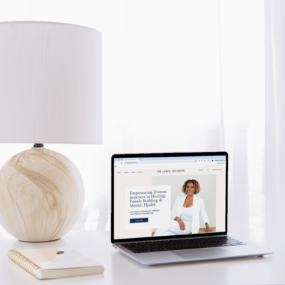 Laptop displaying a custom Showit website for Dr. Loree Johnson, created by Jennifer Taormina & Co. to showcase client expertise and build trust online.