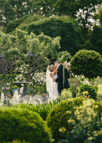 groom holding bride