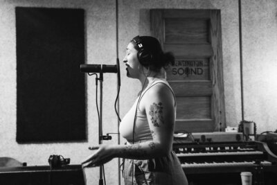 Singer recording in Kensington Sound music studio