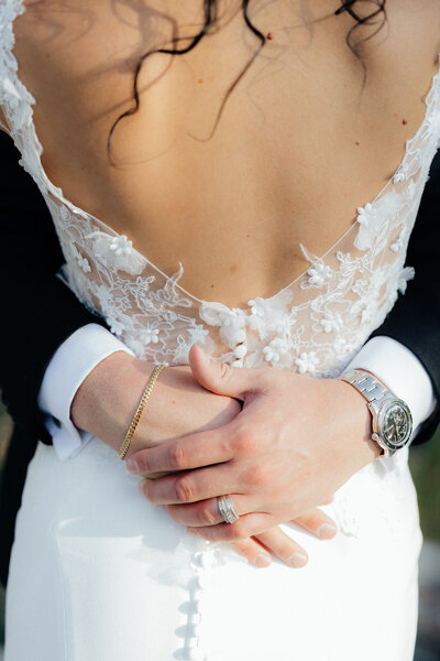 A bride holding her bouquet.