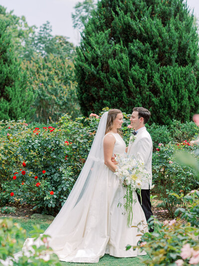 a couple embracing in a garden