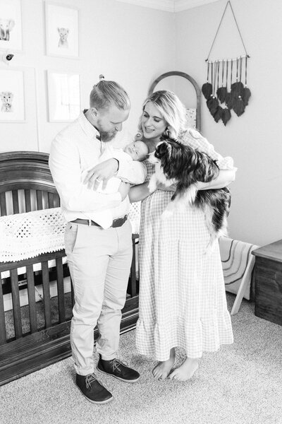 Photographer Shelby Mullins and her husband Kin with their dog and baby