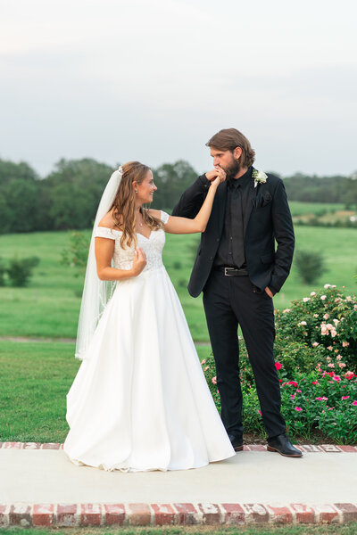 Austin Bride and Groom holding each other. 