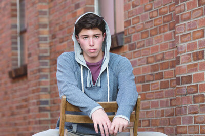 senior-guy-brick-alley-with-hoodie