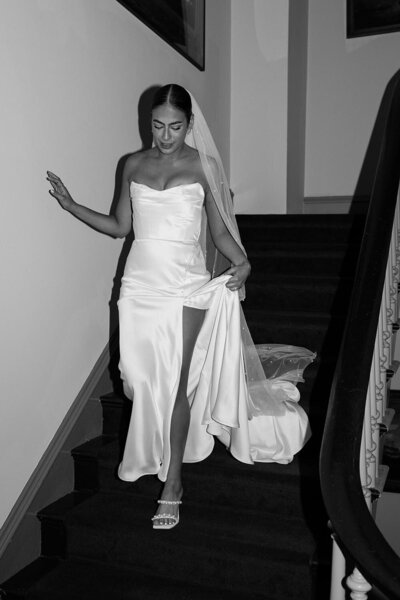 bride walking down stairs at her philadelphia pa wedding