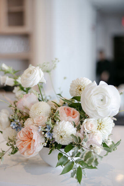 summer flower arrangement with rose snapdragon and anemone