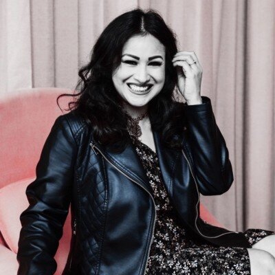 Dark haired woman smiling