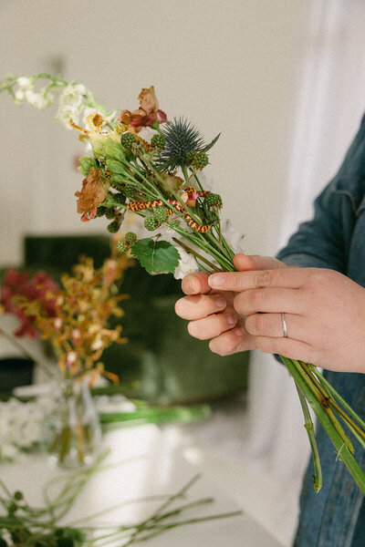 Florist designing wedding flowers in Georgia.