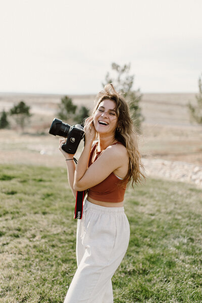 headshot of photographer in a field