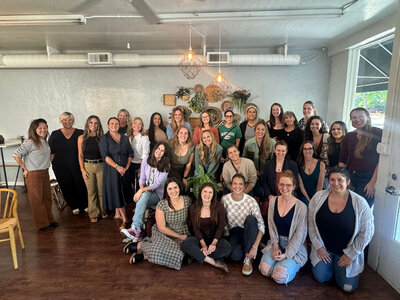 group of women standing and crouched for a group picture