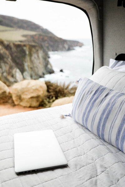 camper bed overlooking the ocean