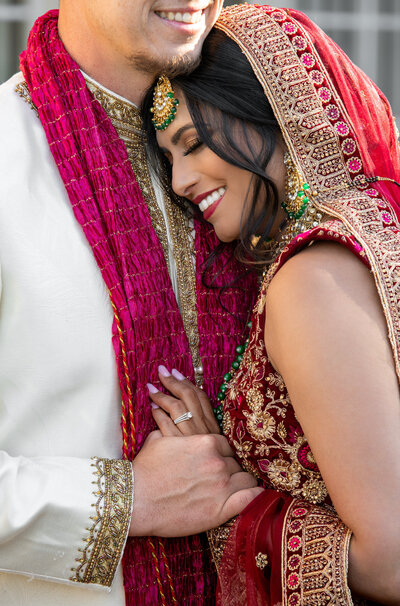 indian couple smiling at their wedding in Detroit