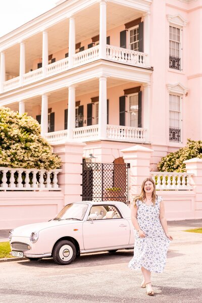 Senior walking and laughing through Charleston streets for timeless, elegant portraits