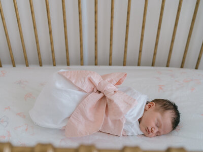 baby on crib newborn photos at home