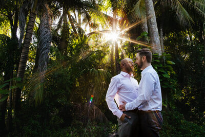 Two Men Embracing in a scenic location for their Engagement Portraits