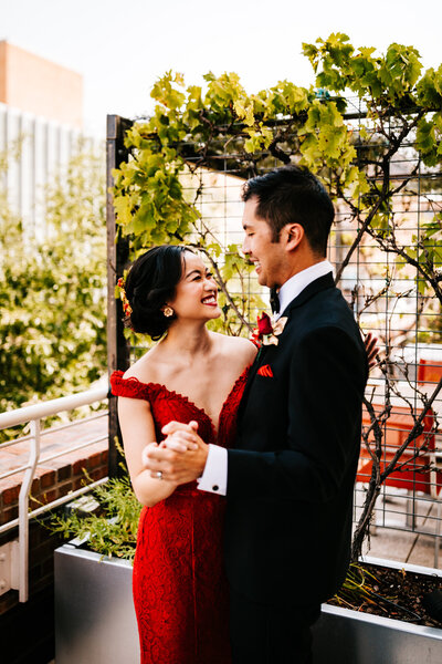 a photo of a chinese wedding and bride in red dress in boston massachusetts