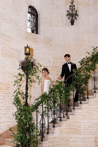 bride and groom portraits taken on the staircase at Howey Mansion FL taken by wedding photographer in Orlando, Blak Marie