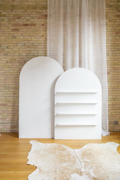 One plain seven foot arch and a six foot shelf arch side by side.