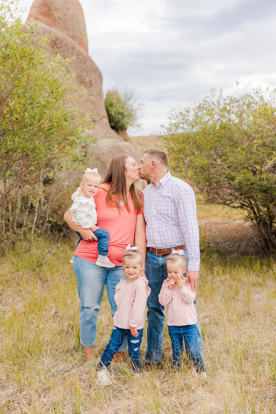 Family of 5 posing together during their family session near Laramie, Wyoming.