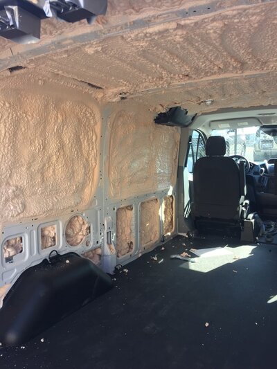 Interior of van insulated with spray foam