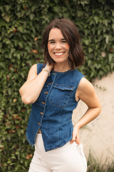 Halea smiling in a blue jean shirt