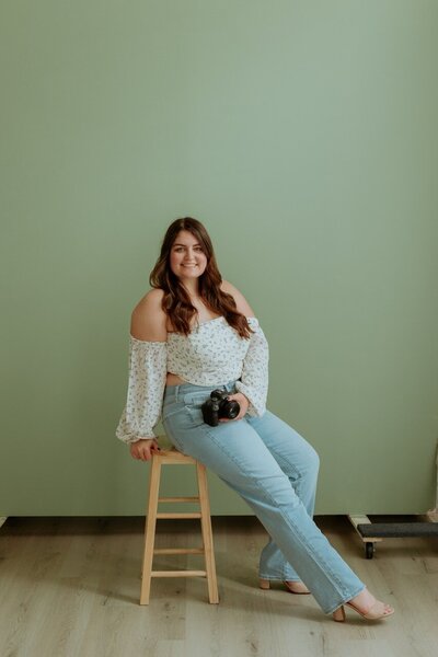 girl standing in a photography studio