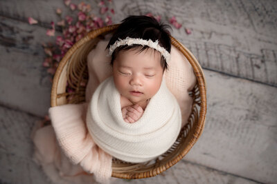 Grand Rapids Newborn Photography Wrapped on Prop by For The Love Of Photography