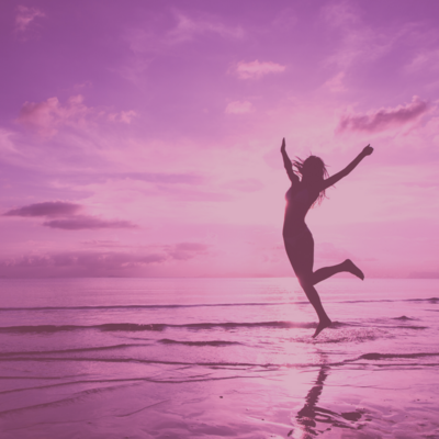 Empower your journey to reclaim vital life force energy and manifest a life of Health, Harmony, & Happiness with the Emotional Security System. Discover the path to emotional well-being symbolized by a carefree woman jumping on the beach. Transform your reality today.