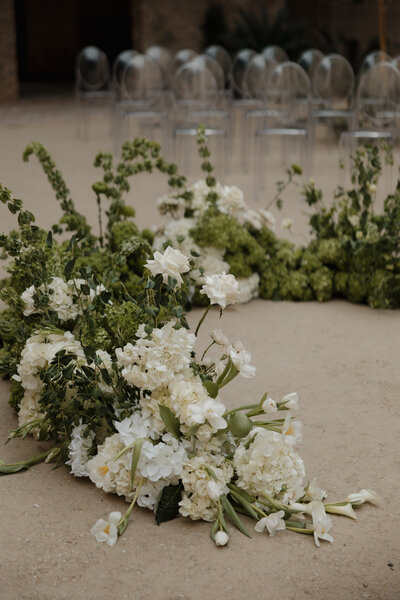 Ceremony flower arch at Monroe Street Abbey in Phoenix AZ designed by Snapdragon Bloom Bar.