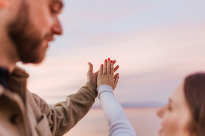 Sand Harbor engagement on the beach at sunset