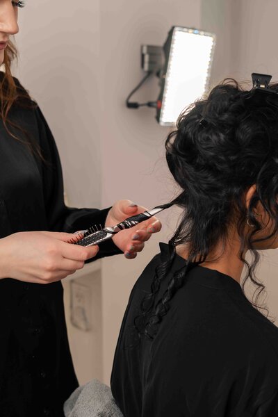 women getting hair styled