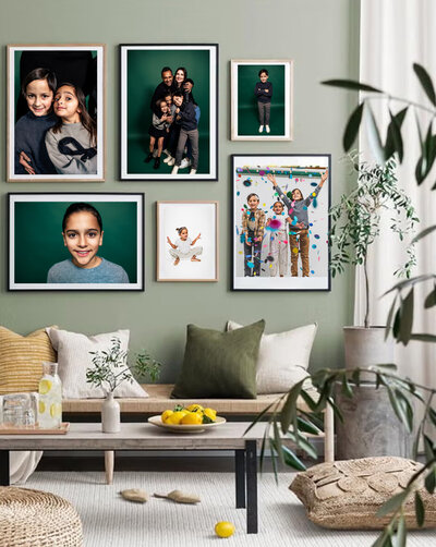 A beautiful garden green foyer with custom framed wall art of a family, which would make a great choice to display your senior photos Pittsburgh.