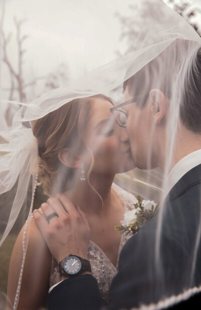 Bride looking at groom - smiling
